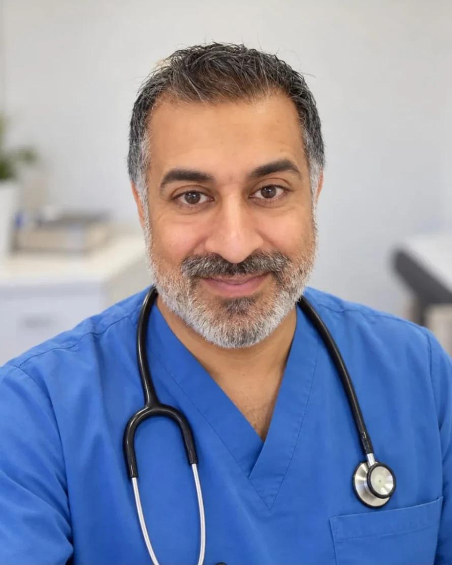Dr Sandy Rai, GP, in clinic